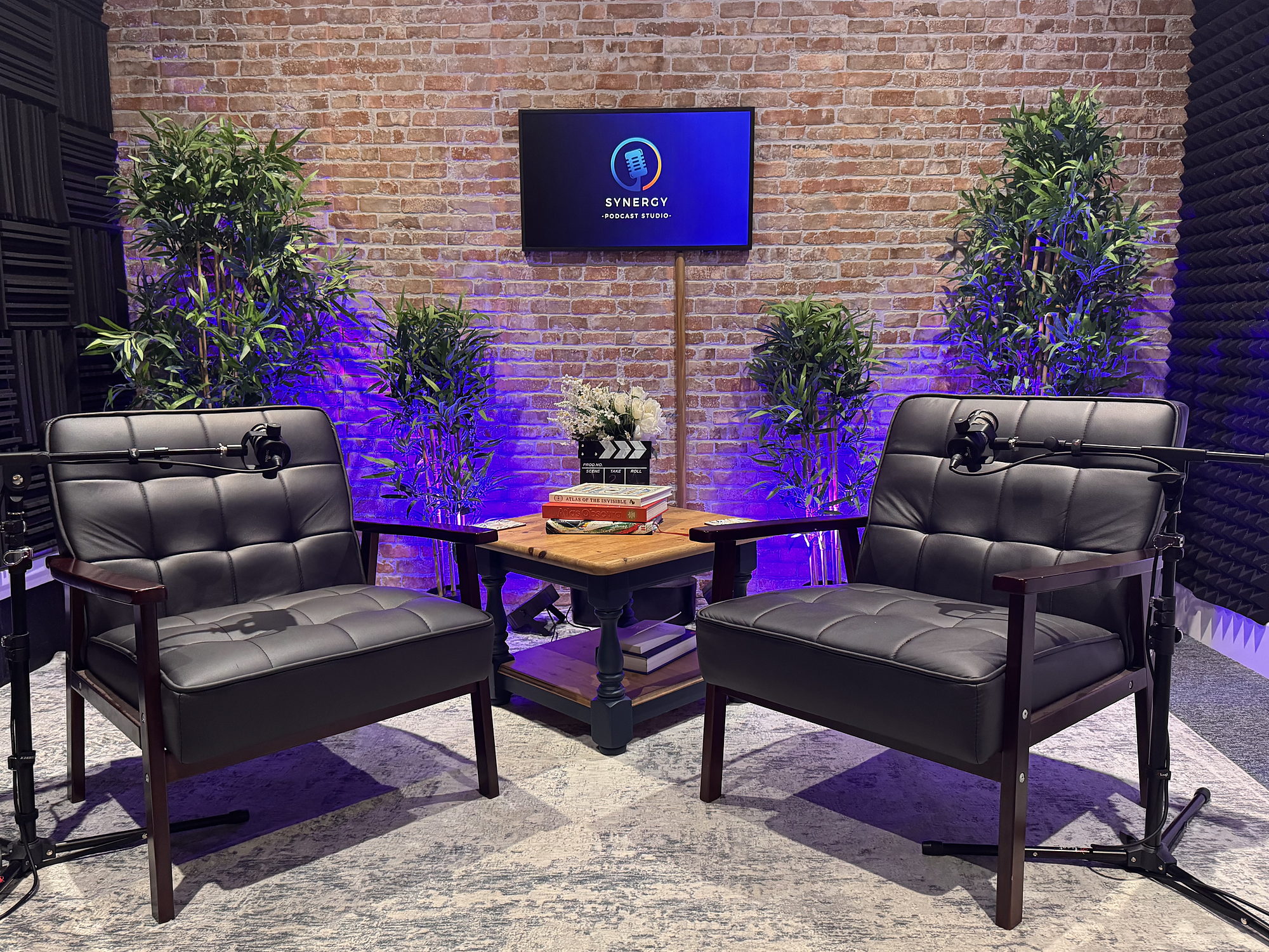Black chairs and brick wall setup