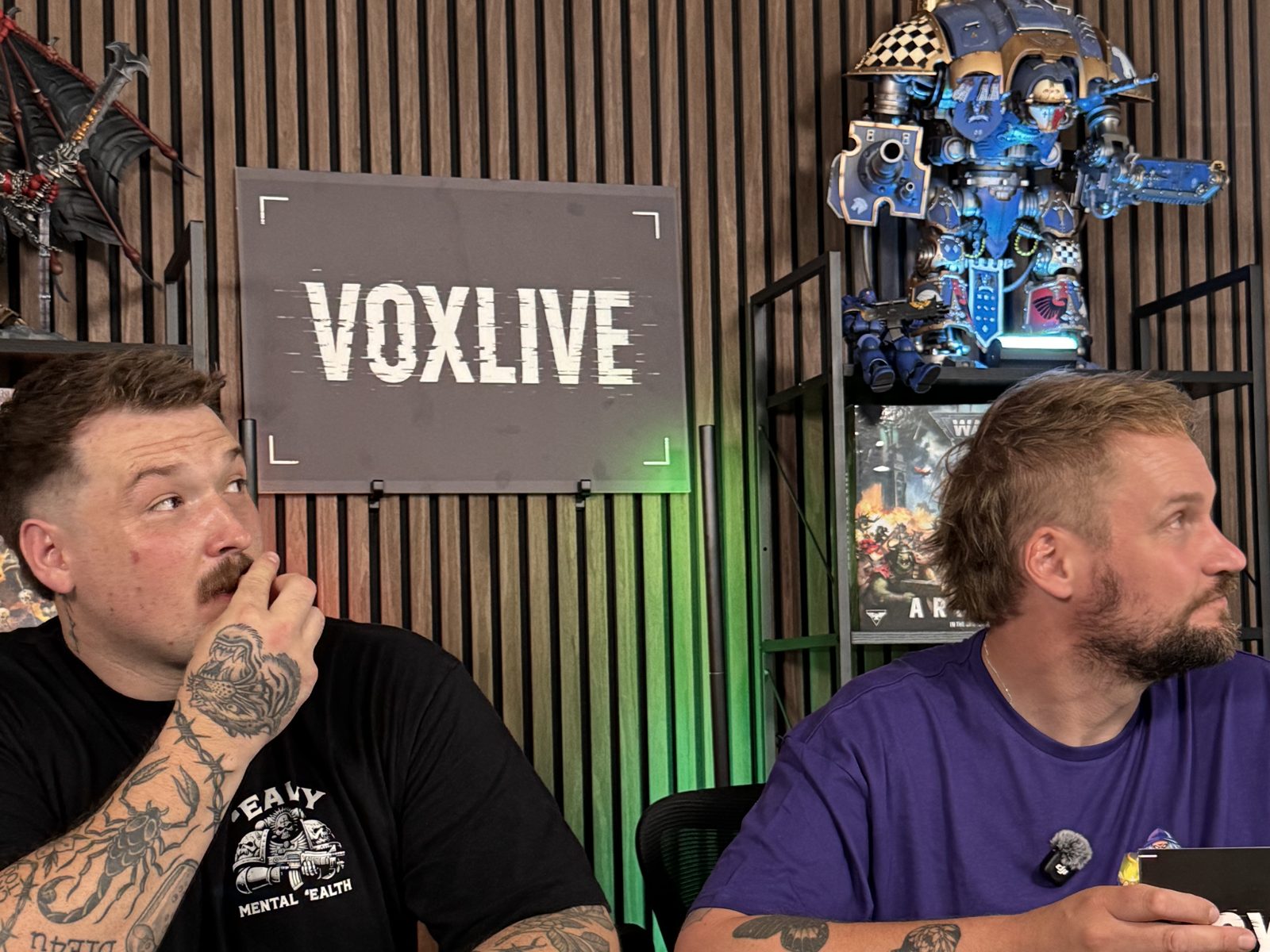 Close-up of the two Vox Live hosts mid-show